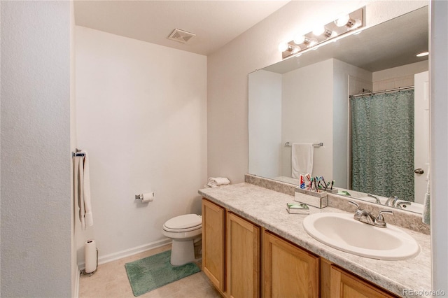 bathroom with toilet, vanity, a shower with curtain, and tile patterned flooring