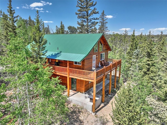 36 Gitche Goone Ln, Como, CO 80432 - back of house with a deck, a patio, and a metal roof