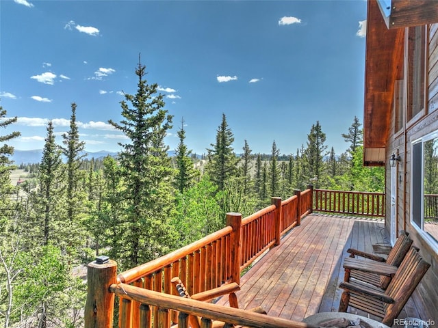 36 Gitche Goone Ln, Como, CO 80432 - wooden deck featuring a view of trees