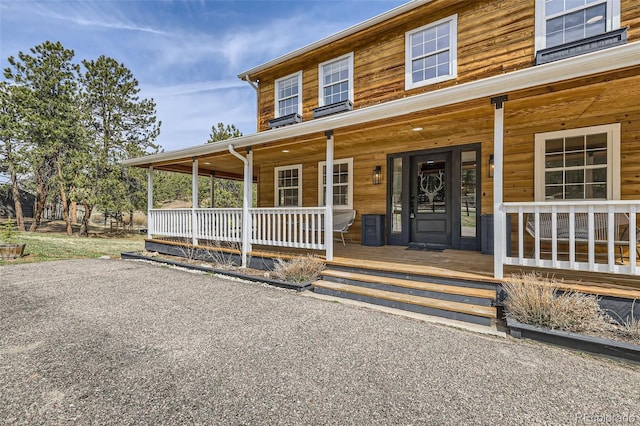 entrance to property with a porch