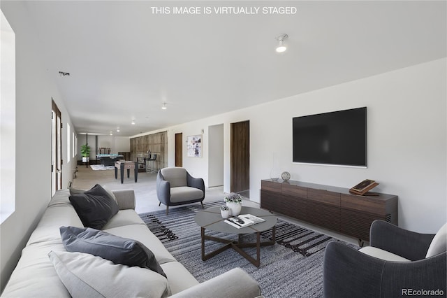 living area with recessed lighting