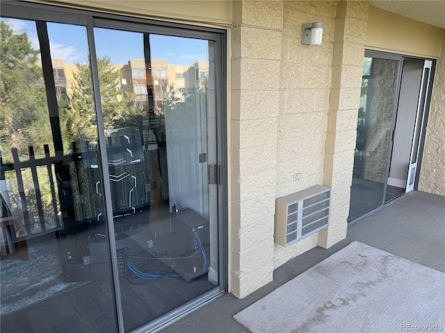 property entrance with a balcony