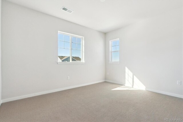 13765 Emerald Lake St, Parker, CO 80138 - carpeted spare room featuring baseboards