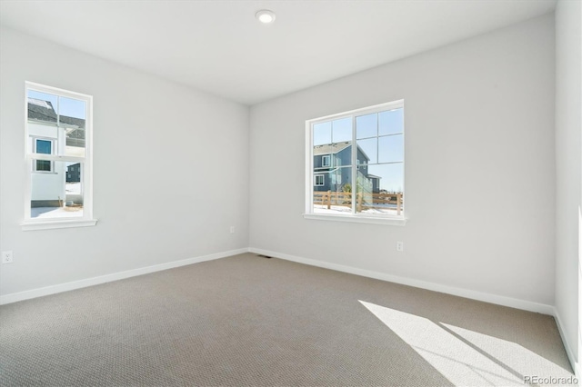 13765 Emerald Lake St, Parker, CO 80138 - carpeted spare room with healthy amount of natural light and baseboards