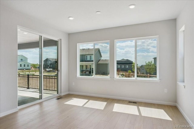 13765 Emerald Lake St, Parker, CO 80138 - empty room with light wood finished floors and recessed lighting