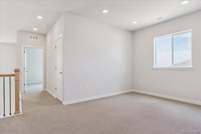 13765 Emerald Lake St, Parker, CO 80138 - spare room with light carpet, recessed lighting, and a smoke detector