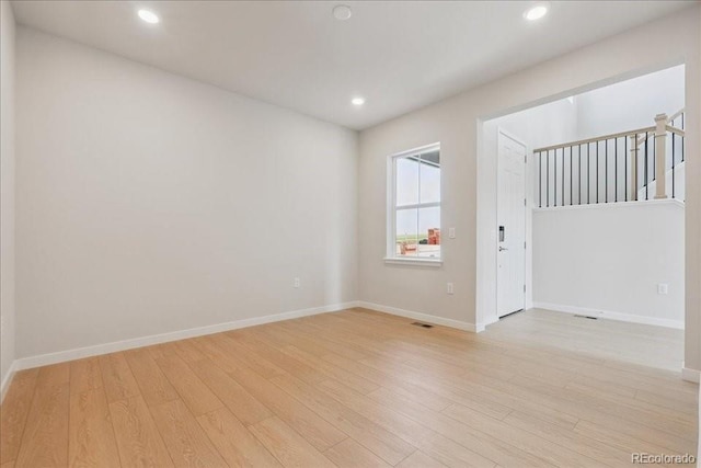 13765 Emerald Lake St, Parker, CO 80138 - spare room featuring light wood-type flooring and recessed lighting