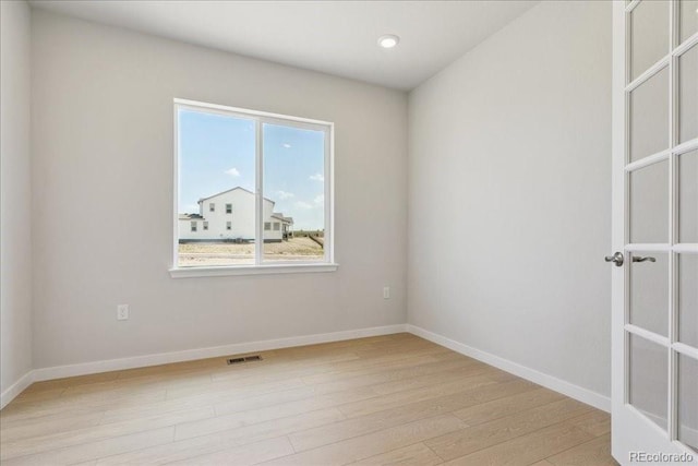 13765 Emerald Lake St, Parker, CO 80138 - empty room featuring light wood-type flooring and recessed lighting