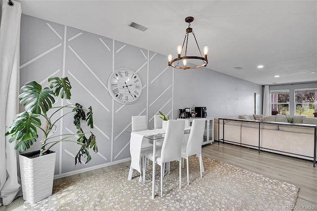 5813 Ceylon St, Denver, CO 80249 - dining room featuring a chandelier, wood finished floors, and recessed lighting
