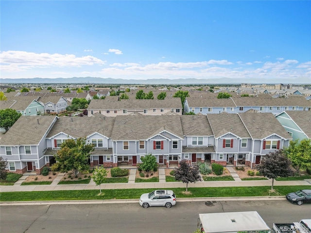 5813 Ceylon St, Denver, CO 80249 - aerial perspective of suburban area with a mountain backdrop