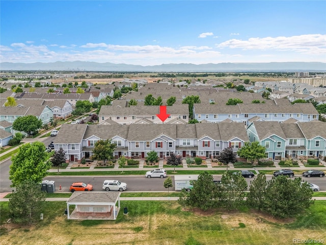 5813 Ceylon St, Denver, CO 80249 - aerial view of residential area featuring mountains