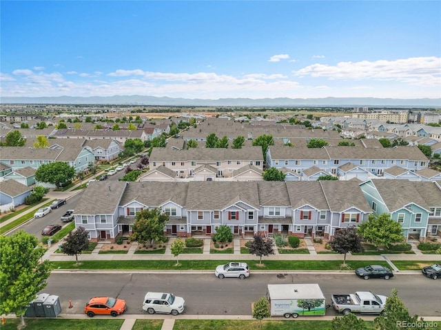 5813 Ceylon St, Denver, CO 80249 - aerial view of residential area with a mountain backdrop
