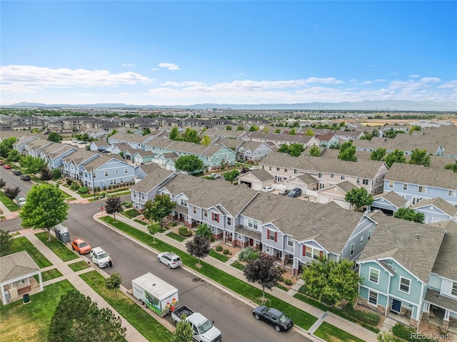 5813 Ceylon St, Denver, CO 80249 - aerial perspective of suburban area featuring a mountainous background