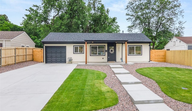 3061 S Glencoe St, Denver, CO 80222 - single story home with an attached garage, a porch, concrete driveway, a fenced backyard, and a shingled roof