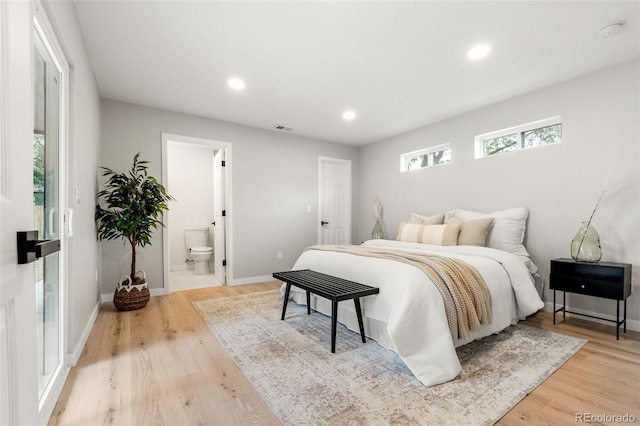 3061 S Glencoe St, Denver, CO 80222 - bedroom featuring light wood-style flooring, recessed lighting, and connected bathroom