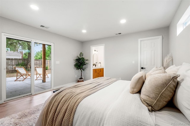 3061 S Glencoe St, Denver, CO 80222 - bedroom featuring access to exterior, light wood-style floors, recessed lighting, and ensuite bathroom