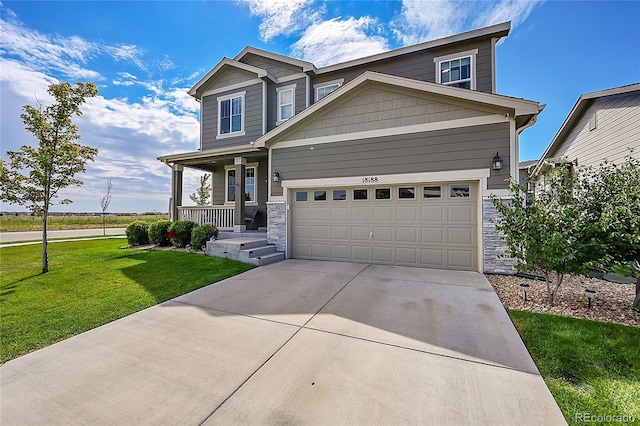 craftsman-style house with covered porch and a front yard