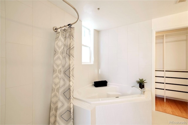 bathroom featuring shower / bath combination with curtain