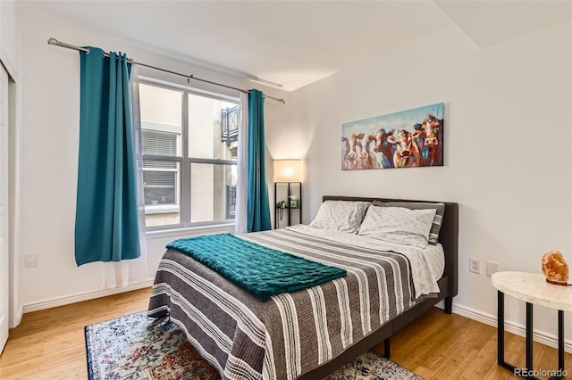 bedroom with light hardwood / wood-style flooring