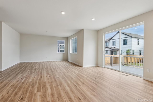 1290 Loraine Cir N, Lafayette, CO 80026 - empty room with light wood-style flooring and recessed lighting