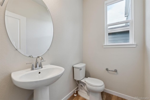 1290 Loraine Cir N, Lafayette, CO 80026 - bathroom featuring baseboards and wood finished floors