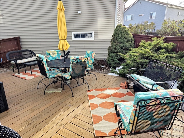 wooden deck with outdoor lounge area