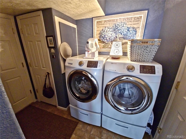 washroom featuring independent washer and dryer