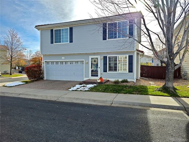 view of front of property featuring a garage