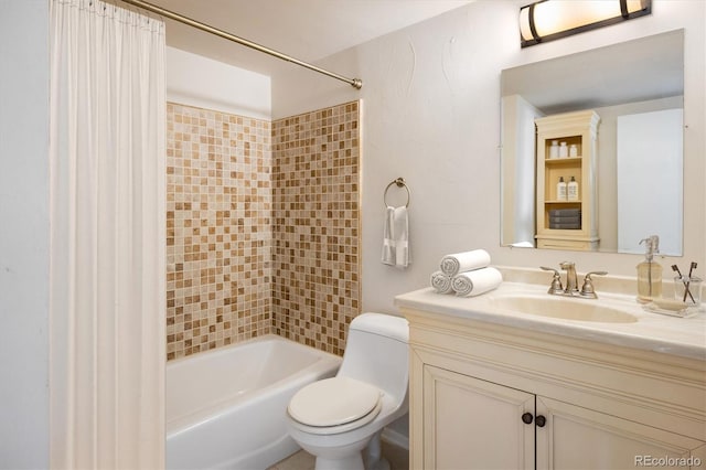 bathroom with vanity, toilet, and tub / shower combination