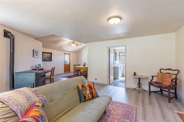 689 County Road 4, Howard, CO 81233 - living room featuring light wood-style floors, ceiling fan, lofted ceiling, and washer / clothes dryer