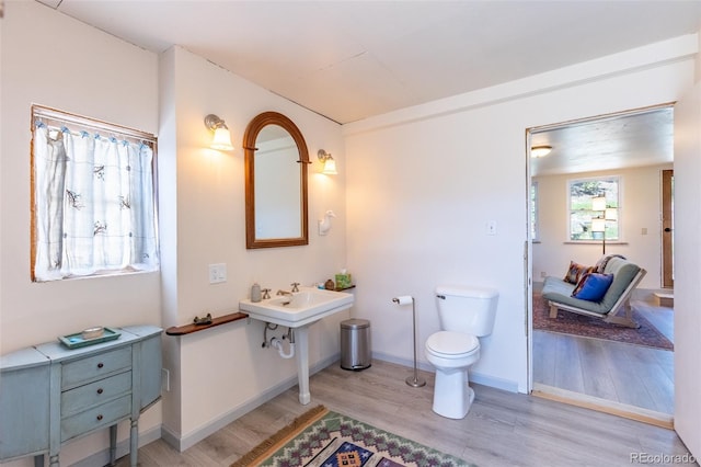 689 County Road 4, Howard, CO 81233 - bathroom featuring wood finished floors and toilet