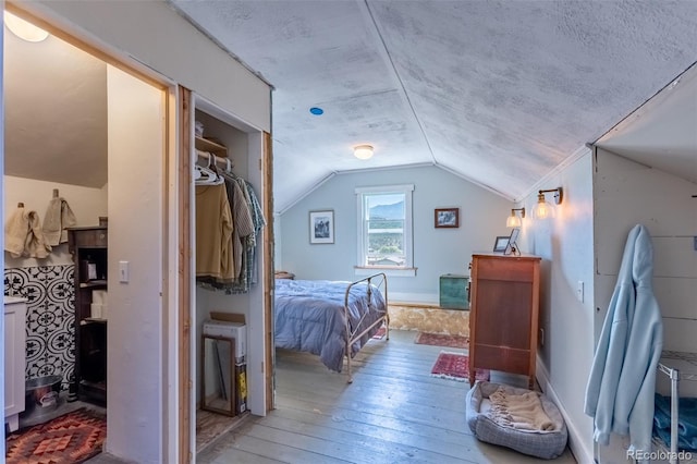689 County Road 4, Howard, CO 81233 - bedroom featuring vaulted ceiling and hardwood / wood-style floors