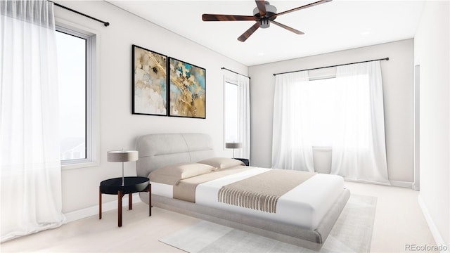 bedroom with baseboards and ceiling fan