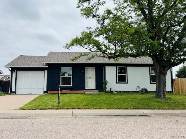 4312 S Xenon St, Morrison, CO 80465 - ranch-style home featuring an attached garage, driveway, and roof with shingles