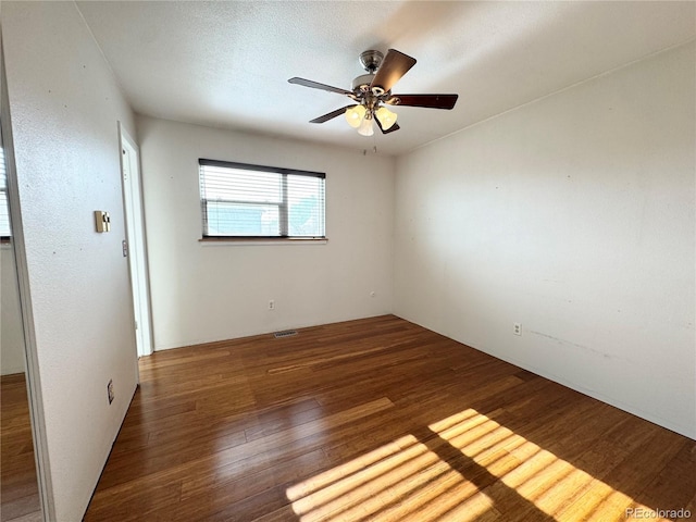 4312 S Xenon St, Morrison, CO 80465 - empty room featuring wood finished floors and ceiling fan
