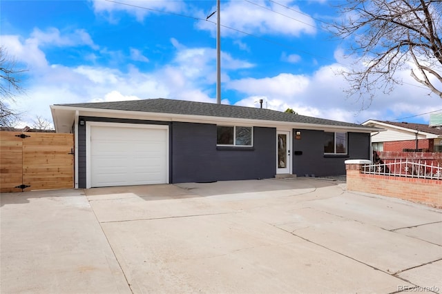 9101 Clarkson St, Thornton, CO 80229 - ranch-style home featuring a garage, concrete driveway, and roof with shingles