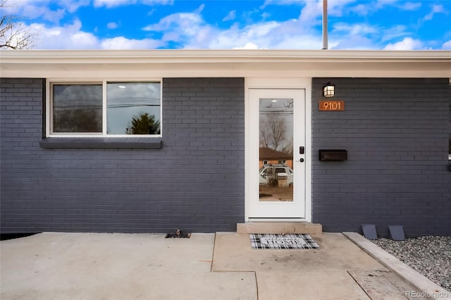 9101 Clarkson St, Thornton, CO 80229 - doorway to property featuring brick siding