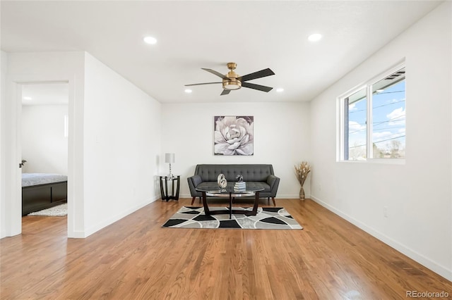 9101 Clarkson St, Thornton, CO 80229 - sitting room featuring ceiling fan, recessed lighting, light wood-style floors, and baseboards