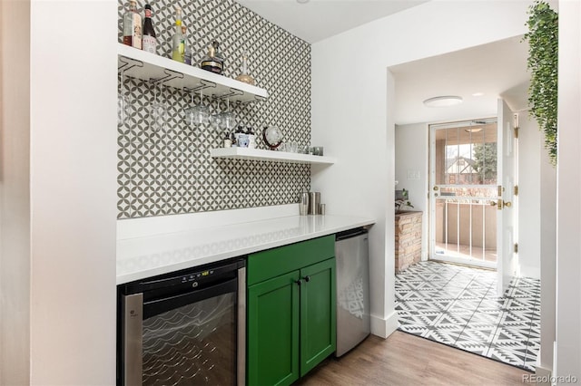 2250 N Monaco Pkwy, Denver, CO 80207 - indoor dry bar with wine cooler, refrigerator, and light wood finished floors