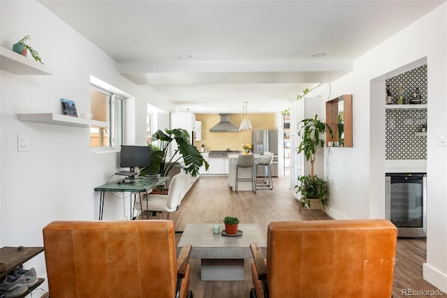 2250 N Monaco Pkwy, Denver, CO 80207 - living room featuring beverage cooler, light wood-type flooring, and recessed lighting