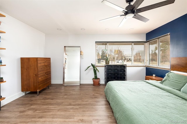 2250 N Monaco Pkwy, Denver, CO 80207 - bedroom with wood finished floors, a ceiling fan, and recessed lighting