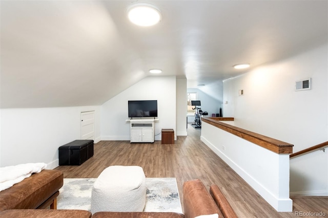 2250 N Monaco Pkwy, Denver, CO 80207 - living area with wood finished floors and lofted ceiling