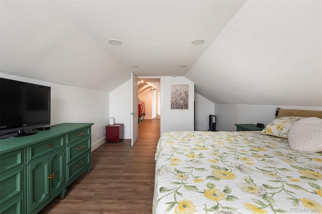 2250 N Monaco Pkwy, Denver, CO 80207 - bedroom with dark wood-style floors and vaulted ceiling