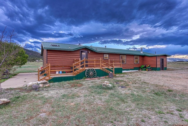 exterior space featuring a wooden deck