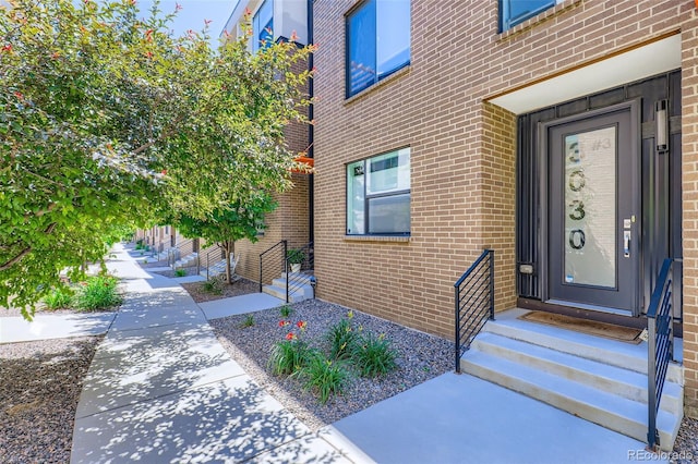 3030 N Wilson Ct Unit 3, Denver, CO 80205 - doorway to property featuring brick siding