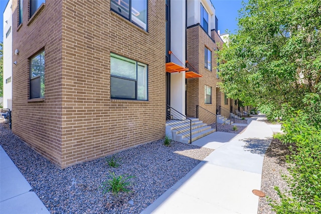 3030 N Wilson Ct Unit 3, Denver, CO 80205 - view of front facade featuring brick siding