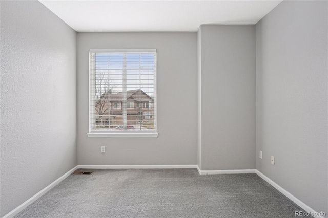 20481 E Mansfield Pl, Aurora, CO 80013 - spare room with carpet floors and baseboards