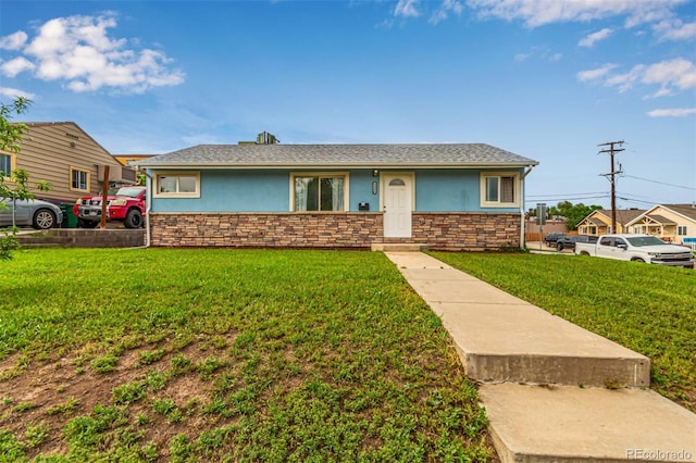 5001 W Nevada Pl, Denver, CO 80219 - ranch-style house with stucco siding, a front lawn, and stone siding