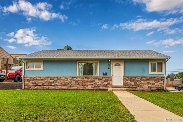 5001 W Nevada Pl, Denver, CO 80219 - single story home featuring stucco siding, stone siding, and a front yard