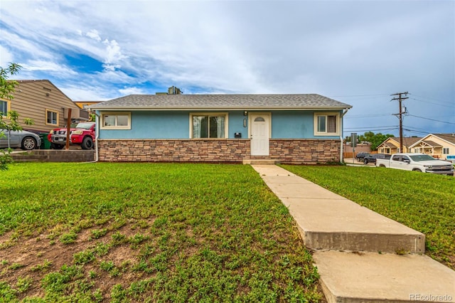5001 W Nevada Pl, Denver, CO 80219 - single story home featuring stucco siding, a front lawn, and stone siding